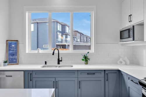153 Edith Way Nw, Calgary, AB - Indoor Photo Showing Kitchen With Double Sink