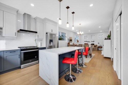 153 Edith Way Nw, Calgary, AB - Indoor Photo Showing Kitchen With Stainless Steel Kitchen With Upgraded Kitchen
