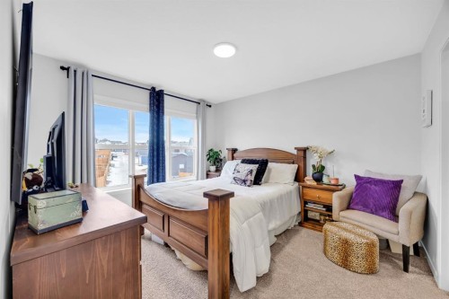 153 Edith Way Nw, Calgary, AB - Indoor Photo Showing Bedroom