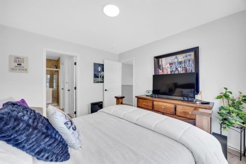 153 Edith Way Nw, Calgary, AB - Indoor Photo Showing Bedroom