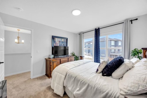 153 Edith Way Nw, Calgary, AB - Indoor Photo Showing Bedroom