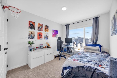 153 Edith Way Nw, Calgary, AB - Indoor Photo Showing Bedroom