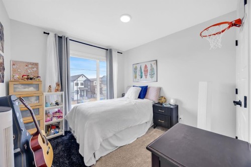 153 Edith Way Nw, Calgary, AB - Indoor Photo Showing Bedroom