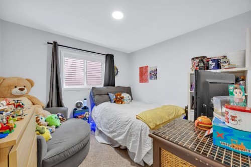 153 Edith Way Nw, Calgary, AB - Indoor Photo Showing Bedroom