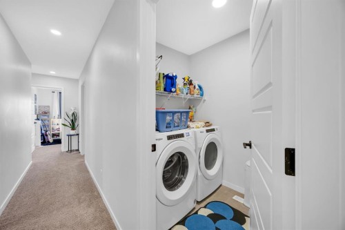 153 Edith Way Nw, Calgary, AB - Indoor Photo Showing Laundry Room