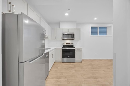 153 Edith Way Nw, Calgary, AB - Indoor Photo Showing Kitchen With Stainless Steel Kitchen With Upgraded Kitchen