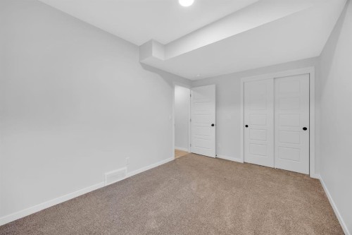 153 Edith Way Nw, Calgary, AB - Indoor Photo Showing Other Room