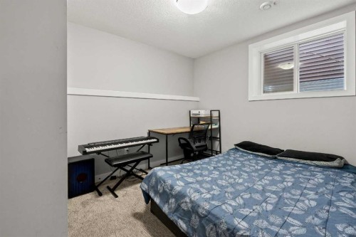 320 Nolancrest Circle Nw, Calgary, AB - Indoor Photo Showing Bedroom
