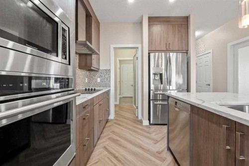 320 Nolancrest Circle Nw, Calgary, AB - Indoor Photo Showing Kitchen With Upgraded Kitchen