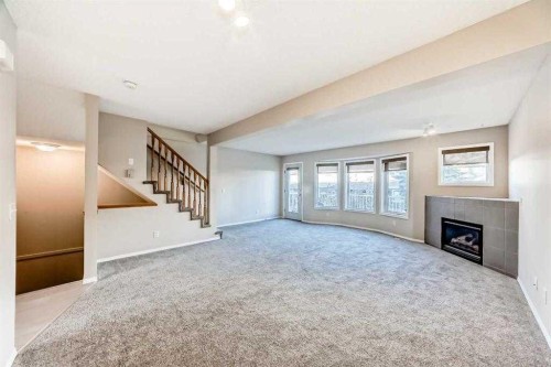 677 Regal Park Ne, Calgary, AB - Indoor With Fireplace