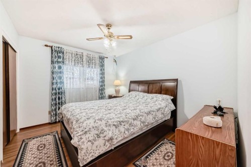 9936 Warren Road Se, Calgary, AB - Indoor Photo Showing Bedroom