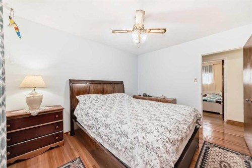9936 Warren Road Se, Calgary, AB - Indoor Photo Showing Bedroom