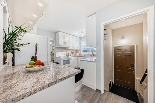 9936 Warren Road Se, Calgary, AB - Indoor Photo Showing Kitchen