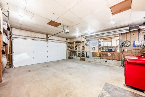9936 Warren Road Se, Calgary, AB - Indoor Photo Showing Garage