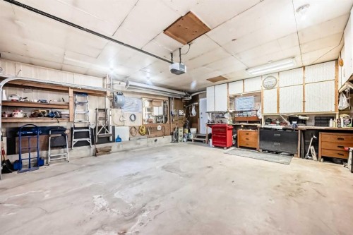 9936 Warren Road Se, Calgary, AB - Indoor Photo Showing Garage