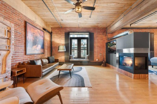 305-535 10 Avenue Sw, Calgary, AB - Indoor Photo Showing Living Room With Fireplace