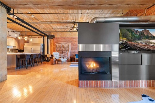 305-535 10 Avenue Sw, Calgary, AB - Indoor Photo Showing Living Room With Fireplace