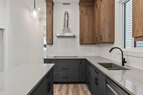 19832 44 Street Se, Calgary, AB - Indoor Photo Showing Kitchen With Double Sink