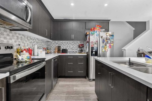 43 Cityside Terrace Ne, Calgary, AB - Indoor Photo Showing Kitchen With Double Sink With Upgraded Kitchen