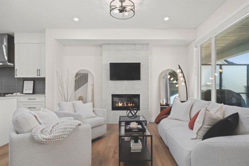 104 Crestridge Common Sw, Calgary, AB - Indoor Photo Showing Living Room With Fireplace