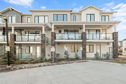 104 Crestridge Common Sw, Calgary, AB - Outdoor With Balcony With Facade