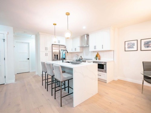 1349 Lake Sylvan Drive Se, Calgary, AB - Indoor Photo Showing Kitchen With Stainless Steel Kitchen With Upgraded Kitchen