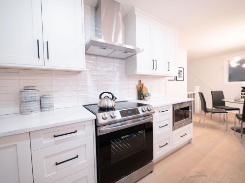 1349 Lake Sylvan Drive Se, Calgary, AB - Indoor Photo Showing Kitchen With Upgraded Kitchen