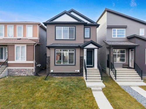 218 Edith Road Nw, Calgary, AB - Outdoor With Facade