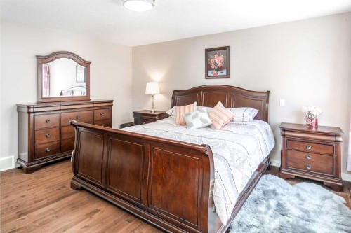 767 Shawnee Drive Sw, Calgary, AB - Indoor Photo Showing Bedroom