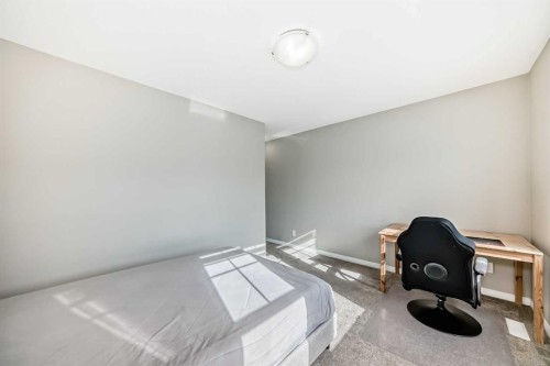 43 Carrington Crescent Nw, Calgary, AB - Indoor Photo Showing Bedroom