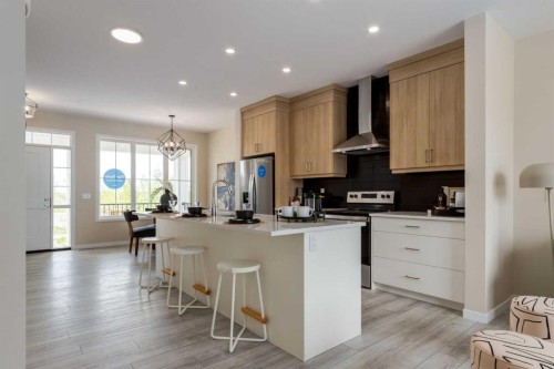 36 Ellen Lane, Crossfield, AB - Indoor Photo Showing Kitchen With Upgraded Kitchen