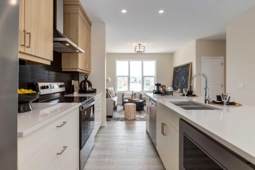 36 Ellen Lane, Crossfield, AB - Indoor Photo Showing Kitchen With Double Sink With Upgraded Kitchen