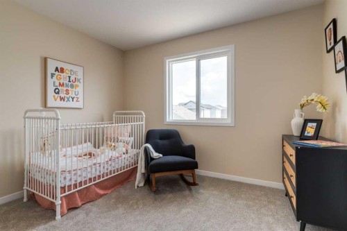 36 Ellen Lane, Crossfield, AB - Indoor Photo Showing Bedroom