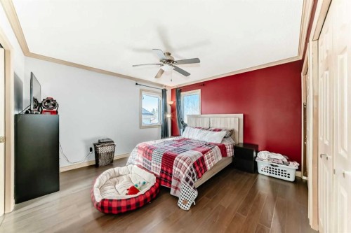 52 Douglas Ridge Close Se, Calgary, AB - Indoor Photo Showing Bedroom