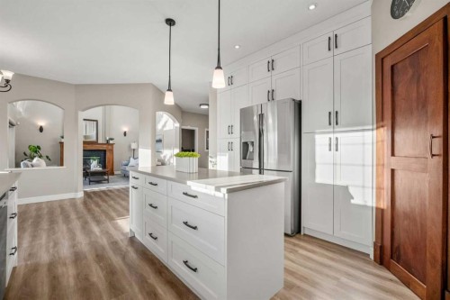 242 Tuscany Ridge Park Nw, Calgary, AB - Indoor Photo Showing Kitchen With Upgraded Kitchen