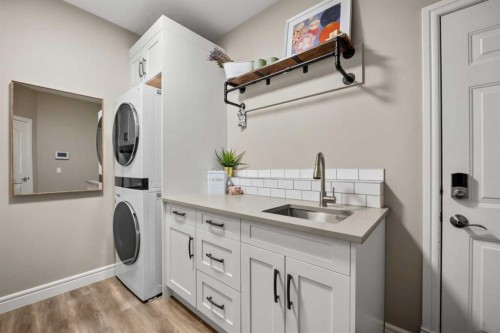 242 Tuscany Ridge Park Nw, Calgary, AB - Indoor Photo Showing Laundry Room