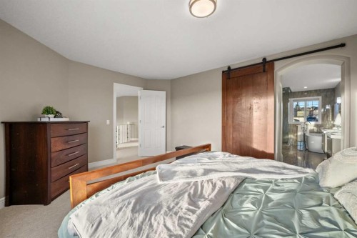 242 Tuscany Ridge Park Nw, Calgary, AB - Indoor Photo Showing Bedroom