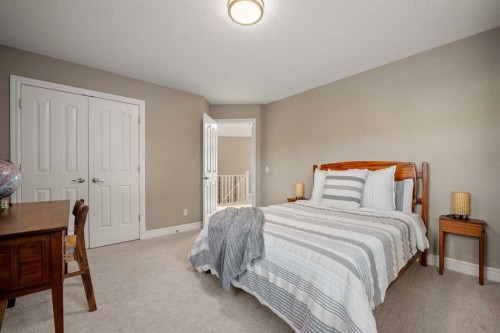 242 Tuscany Ridge Park Nw, Calgary, AB - Indoor Photo Showing Bedroom