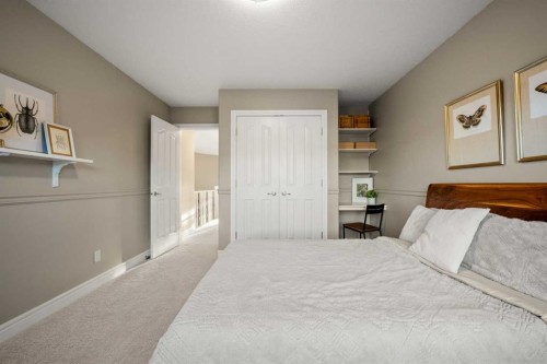 242 Tuscany Ridge Park Nw, Calgary, AB - Indoor Photo Showing Bedroom