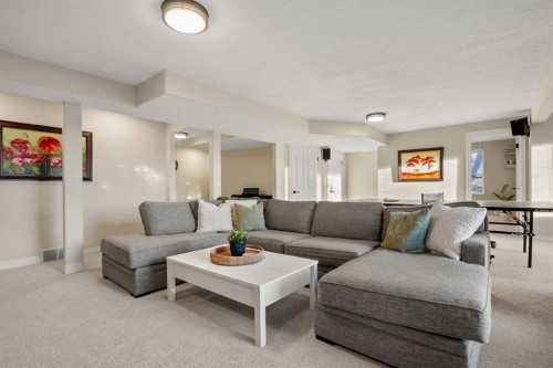 242 Tuscany Ridge Park Nw, Calgary, AB - Indoor Photo Showing Living Room