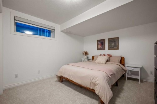 242 Tuscany Ridge Park Nw, Calgary, AB - Indoor Photo Showing Bedroom