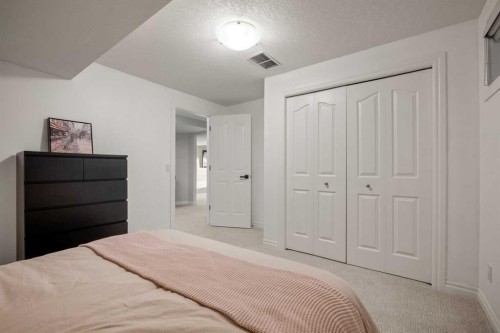242 Tuscany Ridge Park Nw, Calgary, AB - Indoor Photo Showing Bedroom