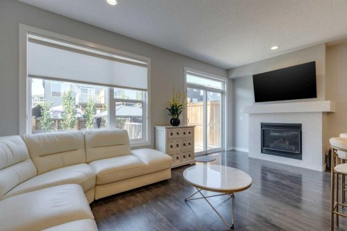 55 Sage Bluff Heights Nw, Calgary, AB - Indoor Photo Showing Living Room With Fireplace