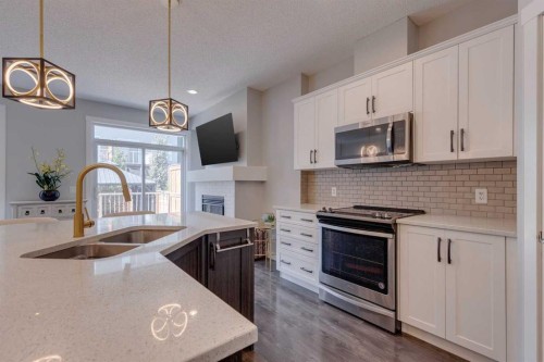 55 Sage Bluff Heights Nw, Calgary, AB - Indoor Photo Showing Kitchen With Double Sink With Upgraded Kitchen