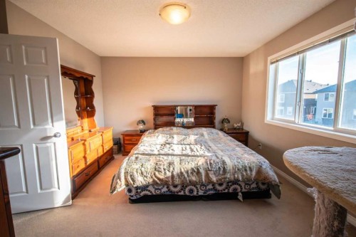 11 Saddlebrook Mews Ne, Calgary, AB - Indoor Photo Showing Bedroom