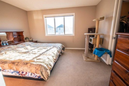 11 Saddlebrook Mews Ne, Calgary, AB - Indoor Photo Showing Bedroom