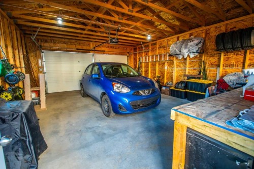 11 Saddlebrook Mews Ne, Calgary, AB - Indoor Photo Showing Garage