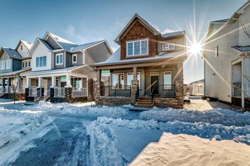 40 Ellen Lane, Crossfield, AB - Outdoor With Deck Patio Veranda With Facade