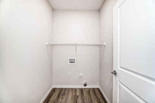 40 Ellen Lane, Crossfield, AB - Indoor Photo Showing Other Room