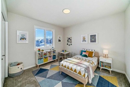 40 Ellen Lane, Crossfield, AB - Indoor Photo Showing Bedroom